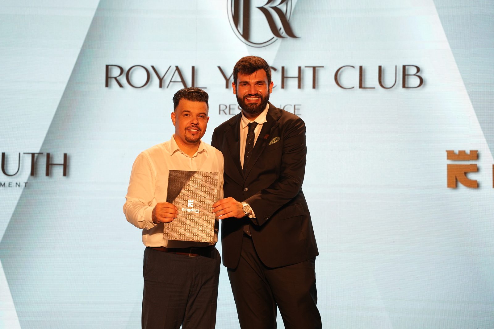Instagram story competition winner receiving a prize on stage